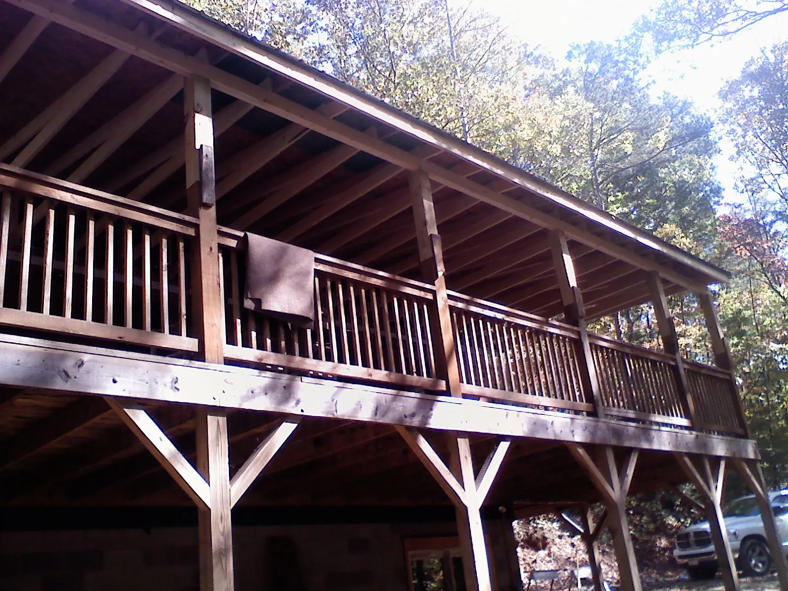 Timber framing under a new elevated porch and deck — Roof Leak Repair in Locust Fork by Roofing Brothers
